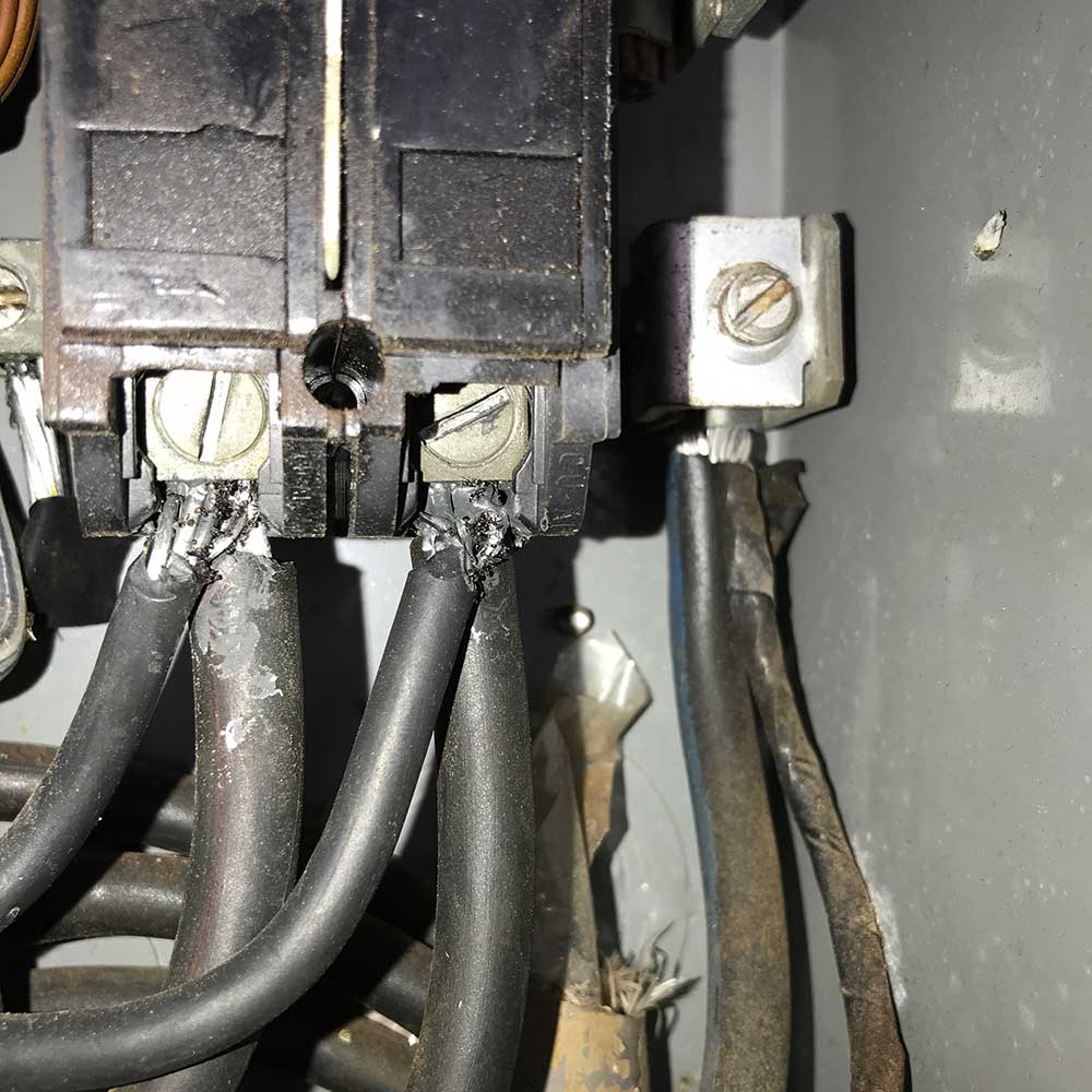 image of electric connections in breaker panel during home inspection
